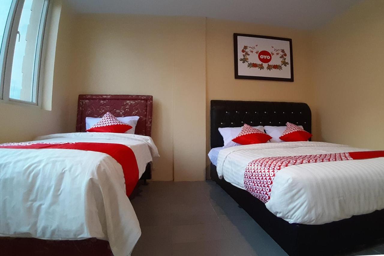 Oyo 1053 Angelyn Home Stay Medan Extérieur photo