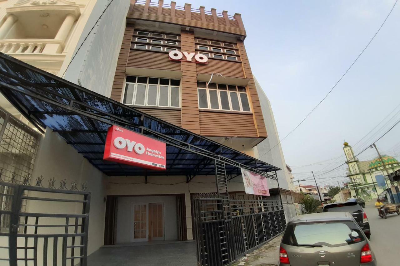 Oyo 1053 Angelyn Home Stay Medan Extérieur photo